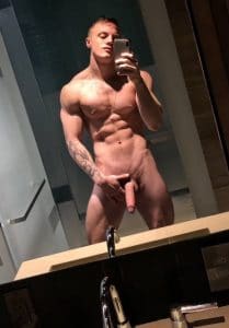 Nude hunk with shaved cock